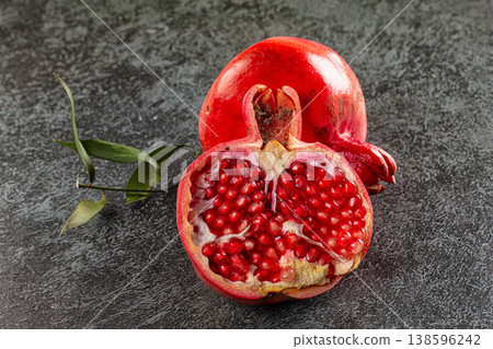 Ripe sweet juicy pomegranate fruit Ripe sweet juicy pomegranate fruit 138596242