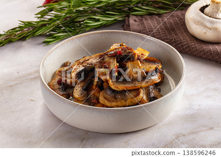 Vegan cuisine - roasted champignon slices Vegan cuisine - roasted champignon slices 138596246