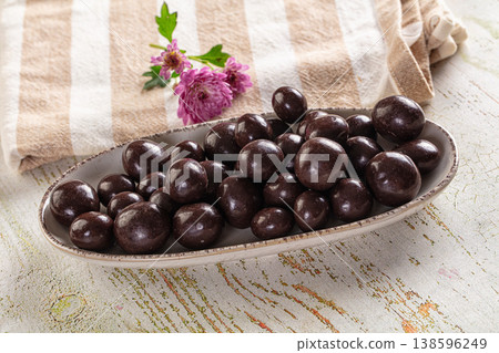 Nut in chocolate balls sweet candy 138596249