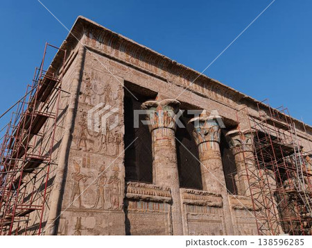 Exterior walls and painted columns of the Temple of Khnum (Temple of Esna) under restoration - Esna, Egypt 138596285