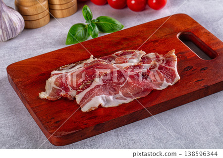 Cured pork Spanish jamon slices Cured pork Spanish jamon slices 138596344