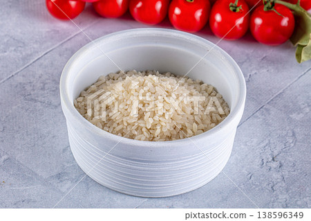 Raw dry white rice grain Raw dry white rice grain 138596349