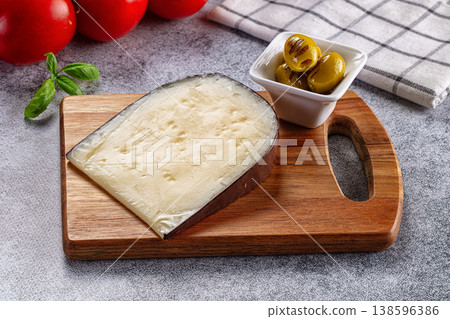 French Gruyere cheese over board French Gruyere cheese over board 138596386