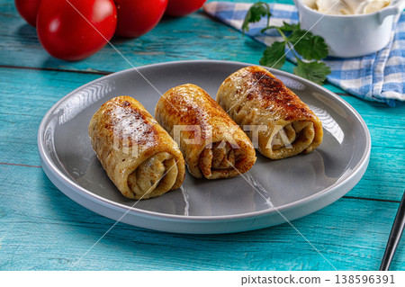 Stuffed homemade pancakes with meat Stuffed homemade pancakes with meat 138596391