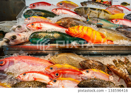 Colorful fresh fish and seafood lined up in the Okinawan market Colorful fresh fish and seafood lined up in the Okinawan market 138596416