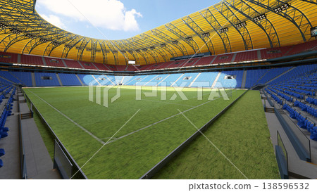 3D render of an empty football stadium. Green grass pitch and blue seats under a yellow roof 3D render of an empty football stadium. Green grass pitch and blue seats under a yellow roof 138596532
