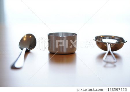 set of stainless steel whisk and spoon 138597553