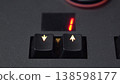 Close-Up Finger Changing Preset with Arrow Buttons on Lighting Mixer, 4K 138598177
