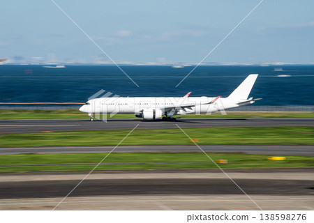 An Airbus A350 landing at Haneda Airport An Airbus A350 landing at Haneda Airport 138598276