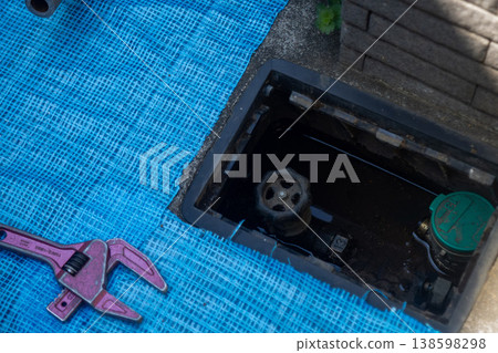 Water meter inspection and piping work site 138598298