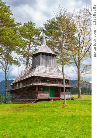 kuzhbeyi, ukraine - 12 may 2019: church on a hill in abandoned village of transcarpathia region, mizhhirya rural district. view of lemko old wooden architecture heritage 138598598