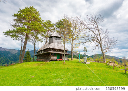 kuzhbeyi, ukraine - 12 may 2019: church on a hill in abandoned village of transcarpathia region, mizhhirya rural district. view of lemko old wooden architecture heritage 138598599
