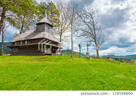 kuzhbeyi, ukraine - 12 may 2019: church on a hill in abandoned village of transcarpathia region, mizhhirya rural district. view of lemko old wooden architecture heritage 138598600
