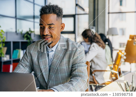 Individual Happily Organizing And Refining Slides For Professional Client Proposal In Modern Workspace Individual Happily Organizing And Refining Slides For Professional Client Proposal In Modern Workspace 138598758