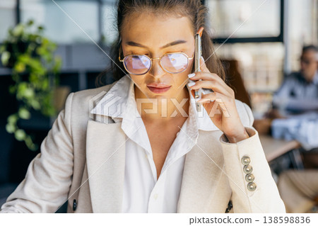 Ambitious Entrepreneur In Energetic Workspace Preparing For Critical Business Presentation And Negotiations Ambitious Entrepreneur In Energetic Workspace Preparing For Critical Business Presentation And Negotiations 138598836