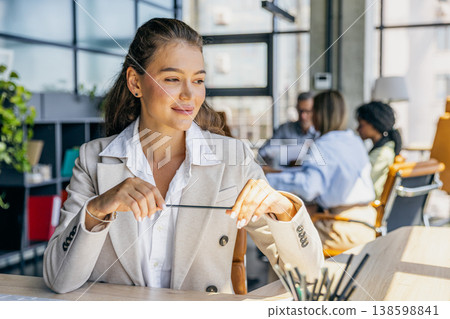 Office professional scrutinizing budget data meticulously 138598841