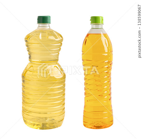 Vegetable oil and water in bottle isolated on white background. Vegetable oil and water in bottle isolated on white background. 138599067