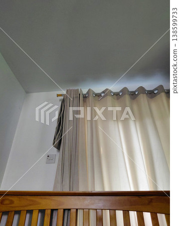 Neutral Room Interior with Bed and Curtain Neutral Room Interior with Bed and Curtain 138599733