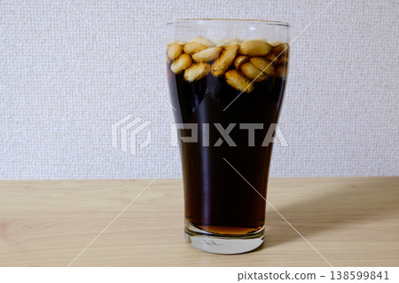 Farmer's Cola, a cola with peanuts added, is a trending drink on social media. 138599841