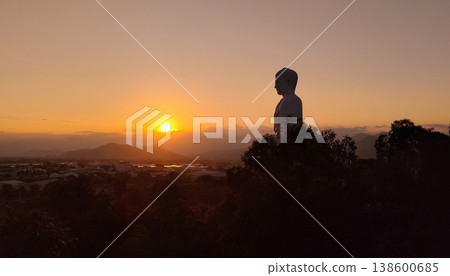 Standing Buddha statue at sunset Tong Lam Son Temple Nha Trang Vietnam 138600685