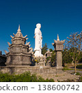 Standing Buddha statue against sky at Tong Lam Son Temple Nha Trang Vietnam 138600742
