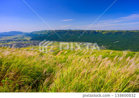 On a clear late summer day, the Aso Milk Road and the Aso Panorama Line offer breathtaking views of the Aso caldera. On a clear late summer day, the Aso Milk Road and the Aso Panorama Line offer breathtaking views of the Aso caldera. 138600832