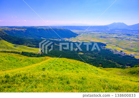On a clear late summer day, the Aso Milk Road and the Aso Panorama Line offer breathtaking views of the Aso caldera. On a clear late summer day, the Aso Milk Road and the Aso Panorama Line offer breathtaking views of the Aso caldera. 138600833