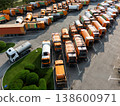Fleet of yellow garbage trucks. Aerial view. 138600971
