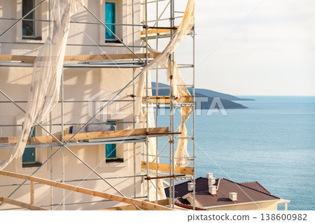 Construction site of a luxury gated community on the seashore Construction site of a luxury gated community on the seashore 138600982