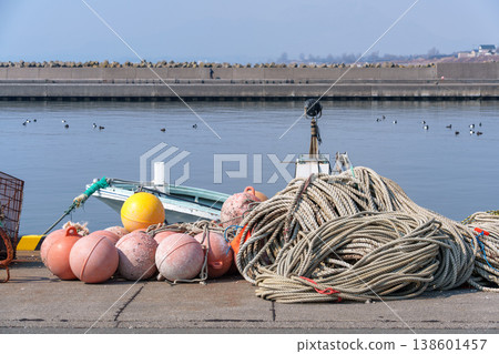 A scene from a fishing port with fishing gear laid out: The reality of Japanese ports and fishing. A scene from a fishing port with fishing gear laid out: The reality of Japanese ports and fishing. 138601457