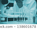 Close up of science glassware with liquid samples in laboratory for chemical and biological research 138601678