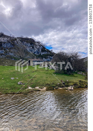 The picturesque Covadonga Lakes nestled in the Picos de Europa mountains, Asturias, Spain, offer breathtaking natural beauty and tranquility The picturesque Covadonga Lakes nestled in the Picos de Europa mountains, Asturias, Spain, offer breathtaking natural beauty and tranquility 138601758