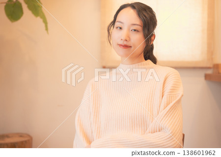 A daughter prays for her deceased loved one at home (retro style) A daughter prays for her deceased loved one at home (retro style) 138601962
