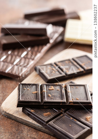 Assortment of white, milk and dark chocolate pieces Assortment of white, milk and dark chocolate pieces 138602237