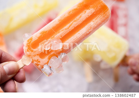 Colorful fruit ice pops on crushed ice, summer refreshment concept 138602487