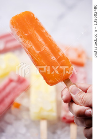 Colorful fruit ice pops on crushed ice, summer refreshment concept 138602490