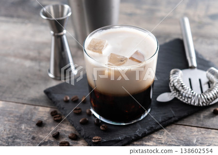 Refreshing Boozy White Russian Cocktail with Vodka and Cream 138602554