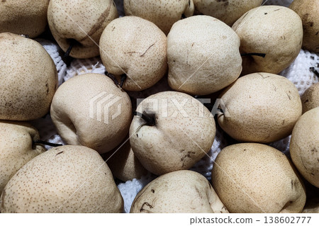 Fresh and Organic Pears Piled Together for Natural Food Presentation, Ideal for Healthy Eating and Culinary Uses in Stock Photography Fresh and Organic Pears Piled Together for Natural Food Presentation, Ideal for Healthy Eating and Culinary Uses in Stock Photography 138602777