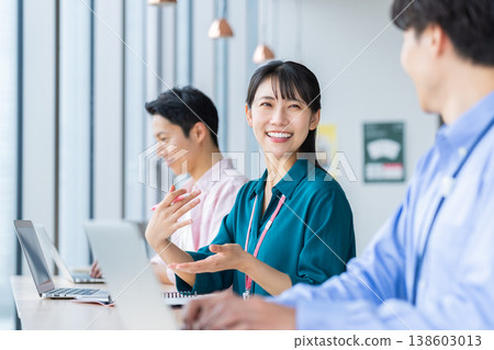 A young female engineer working in an office. Filming assistance provided by: Denpa Gakuen Educational Foundation, Tokyo Electronics College. 138603013