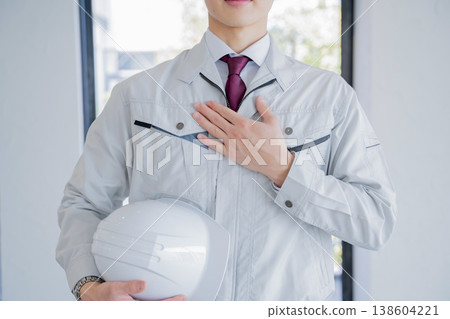 Portrait of a young man in work clothes Portrait of a young man in work clothes 138604221