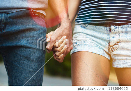 Closeup, love or couple holding hands on outdoor date with support, respect or care on road or street. Trust, zoom or man walking with woman on holiday vacation together for bond, loyalty or relax 138604635
