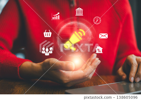 Businesswoman in red sweater holding digital marketing icons, symbolizing modern business strategies and technology. Businesswoman in red sweater holding digital marketing icons, symbolizing modern business strategies and technology. 138605096