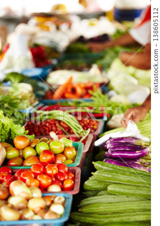Vegetables, market and food or hands for shopping with trader goods, sustainable store and vendor. Seller, people or small business table with tomato, onion and green stock for organic marketplace Vegetables, market and food or hands for shopping with trader goods, sustainable store and vendor. Seller, people or small business table with tomato, onion and green stock for organic marketplace 138605112