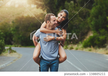 Piggyback, love or happy couple walking on road or date with smile for romance, summer or adventure. Portrait, trust or man with woman on holiday vacation for bond, support or wellness on street Piggyback, love or happy couple walking on road or date with smile for romance, summer or adventure. Portrait, trust or man with woman on holiday vacation for bond, support or wellness on street 138605211