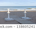 Shower for washing feet from sand. Arrangement of the beach area for the convenience of vacationers.  138605241