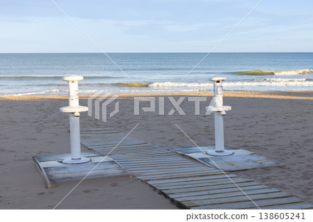 Shower for washing feet from sand. Arrangement of the beach area for the convenience of vacationers. Shower for washing feet from sand. Arrangement of the beach area for the convenience of vacationers. 138605241