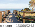 Wooden pier at sunset along the dune beach. 138605248