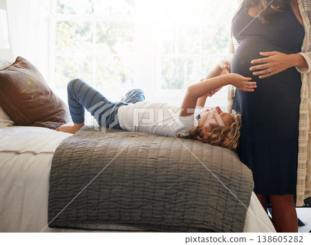 Happy family bedroom, pregnant woman and child touch stomach, abdomen or tummy for moving baby. Home, apartment and youth kid check life growth, pregnancy or belly of mother, mom or mama on bed 138605282