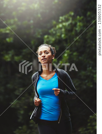 Woman in park, running and fitness in nature, exercise and training for marathon with athlete and sports. Runner, speed and challenge with workout, cardio outdoor for health and wellness with energy 138605332