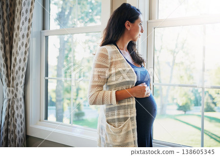 Pregnant woman, future and standing by window, think and trust in maternity, love and hands on stomach. Mother, healthy and care for baby, prenatal wellness and support in motherhood, home and family Pregnant woman, future and standing by window, think and trust in maternity, love and hands on stomach. Mother, healthy and care for baby, prenatal wellness and support in motherhood, home and family 138605345
